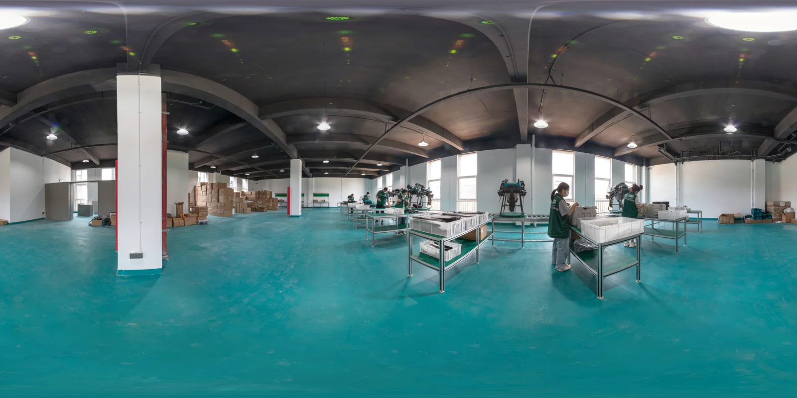 Wide view of the Jitian Intelligent drone assembly workshop in Xuzhou, Jiangsu, with several airframes under build