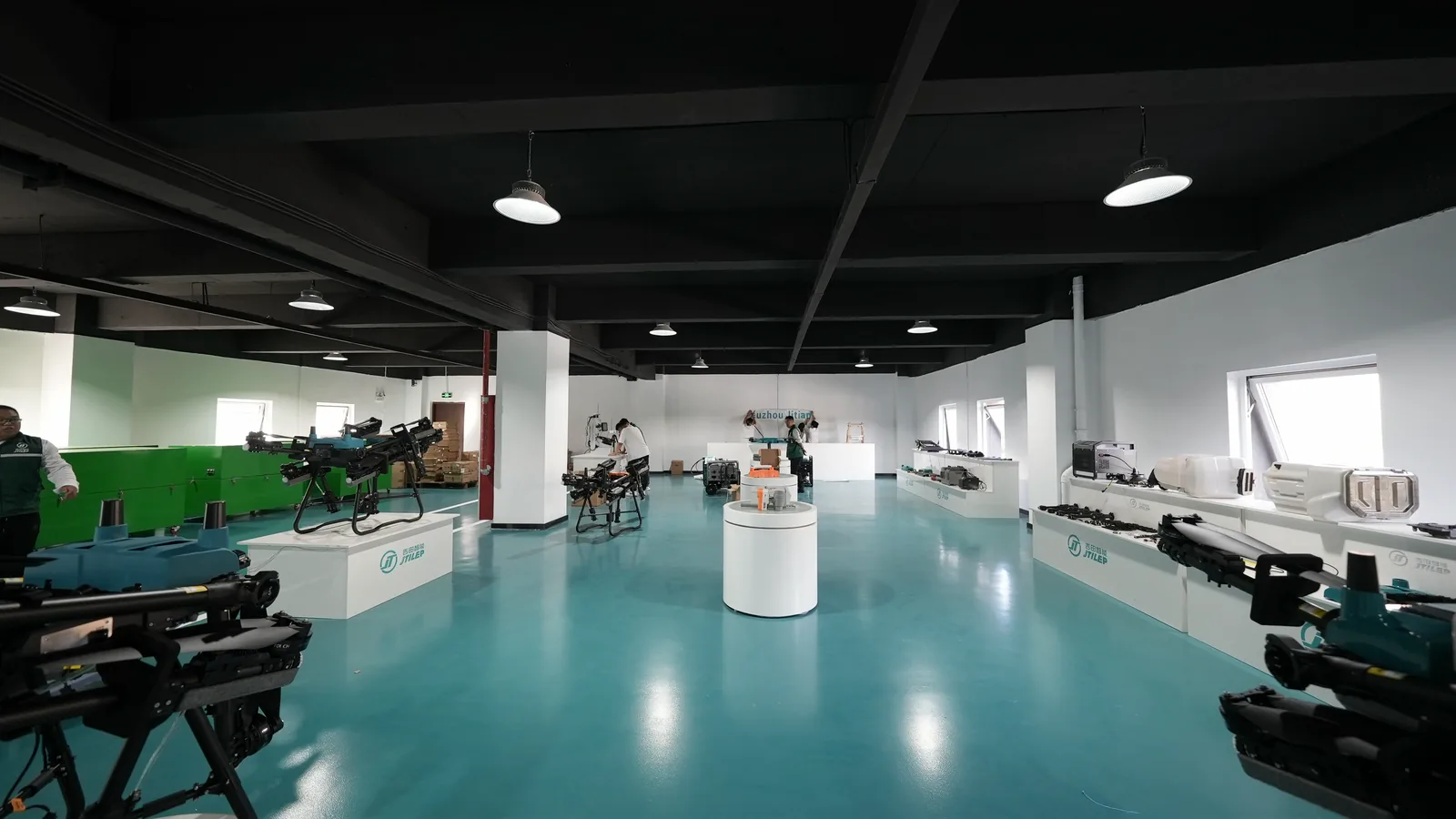 Agricultural spray drones on display in the JTILEP showroom in Xuzhou