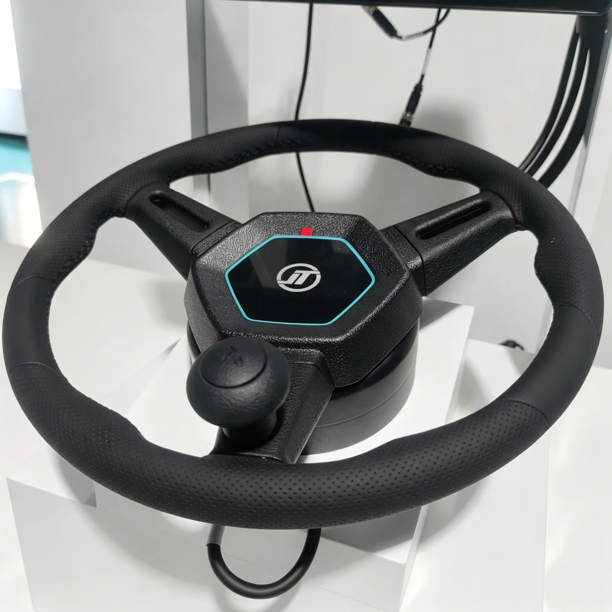 HD818 terminal and steering wheel with the HS-223A receiver and radio antenna mounted on a test frame