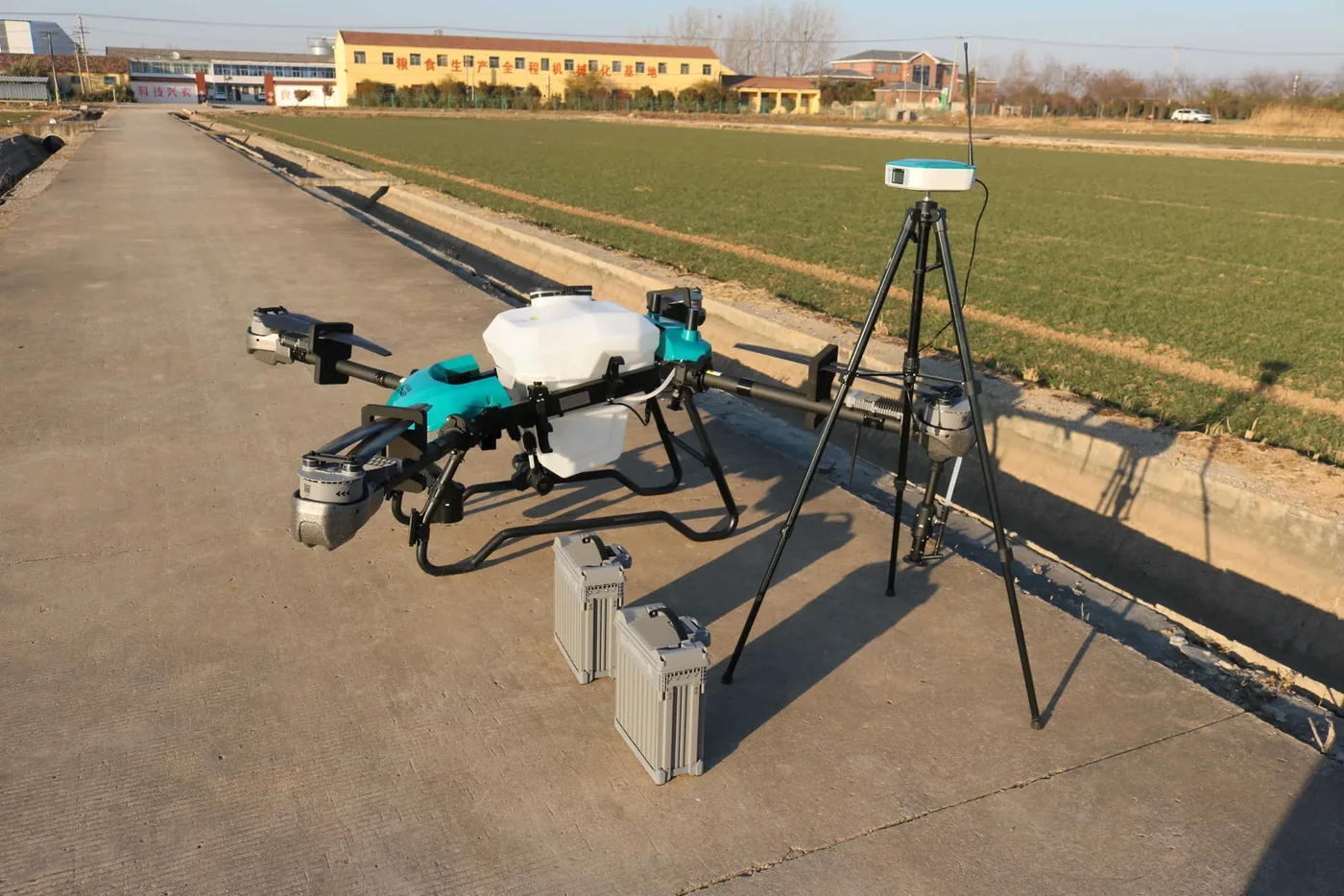 JT-80 agricultural spray drone with 70 L tank working over row crops