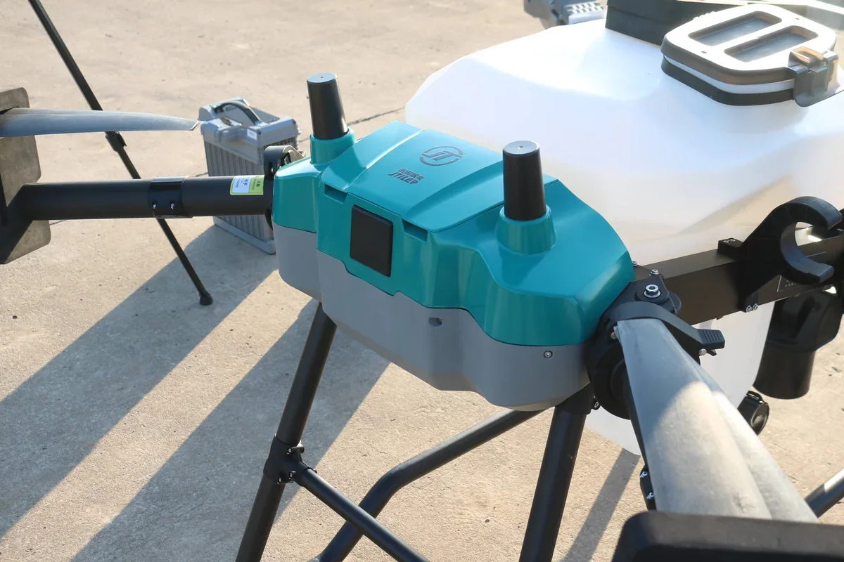Spray drone working a field — the aerial layer of a smart agriculture system